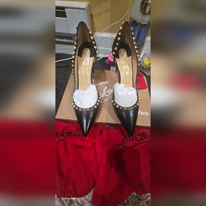 Authentic Christian Louboutin Black Studded Women's Shoes. wore once indoors..